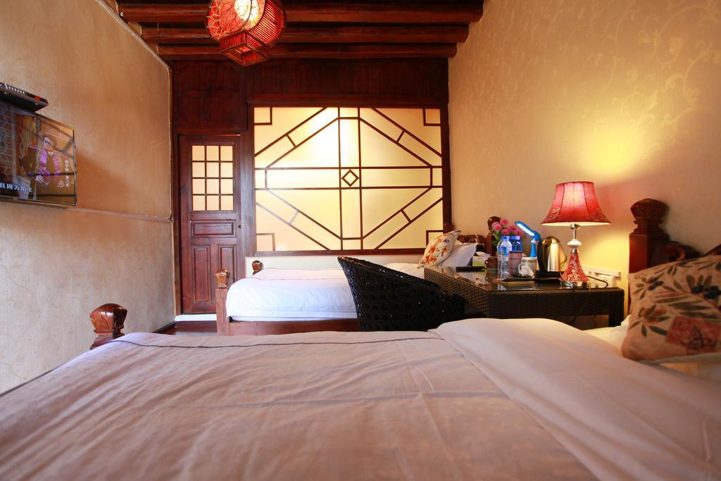 San Fang Qi Xiang Hostel Lijiang  Rom bilde